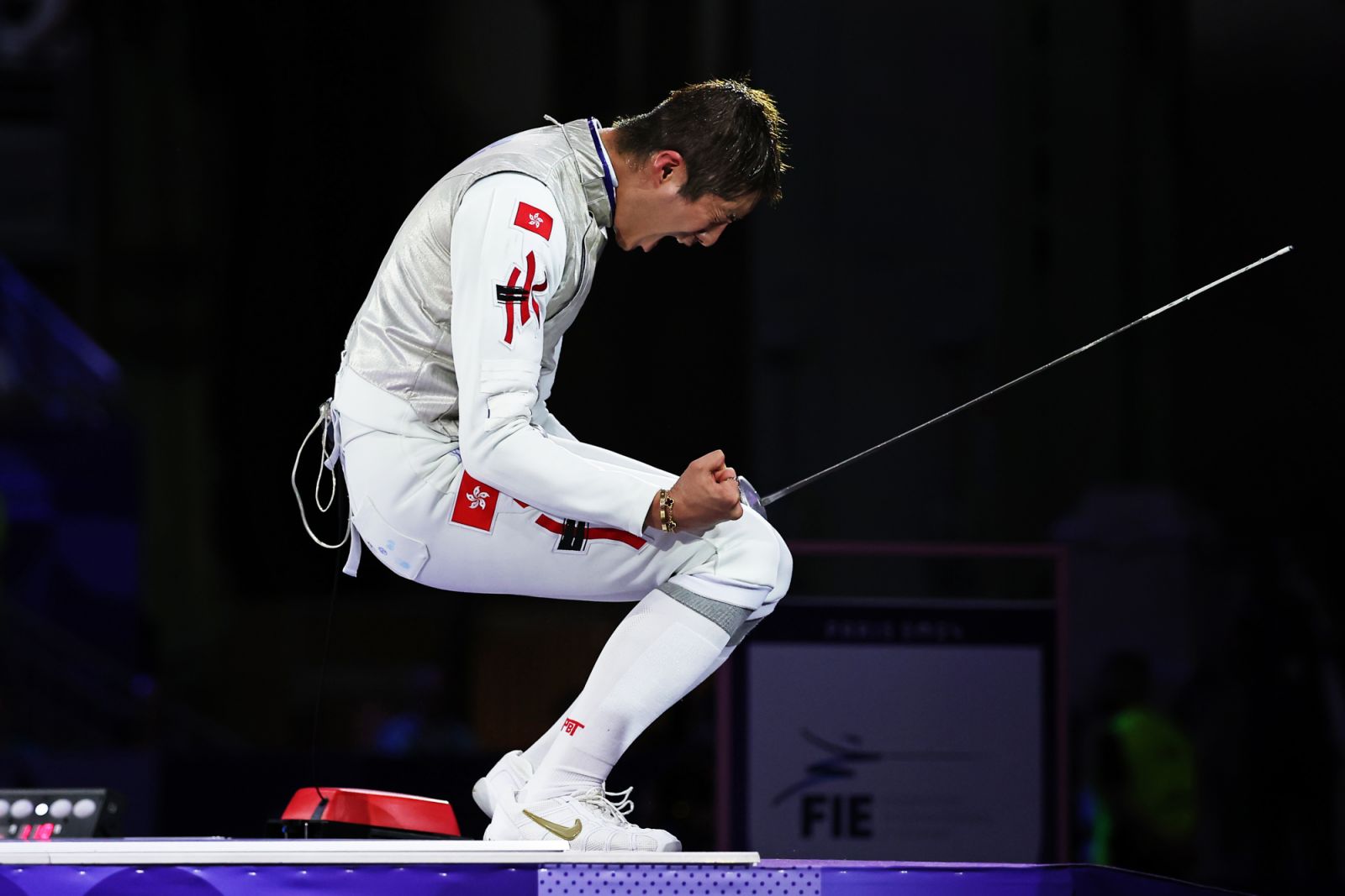 PARIS, FRANCE - JULY 29: Ka Long Cheung of team Hong Kong celebrates winning the Fencing Men's Foil Individual Gold Medal Bout on day three of the Olympic Games Paris 2024 at Grand Palais on July 29, 2024 in Paris, France. (Photo by Al Bello/Getty Images)